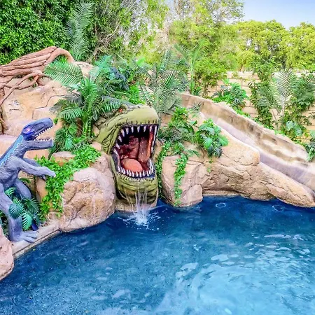 Bomb Dot Com With Dinosaur Waterslide Vila